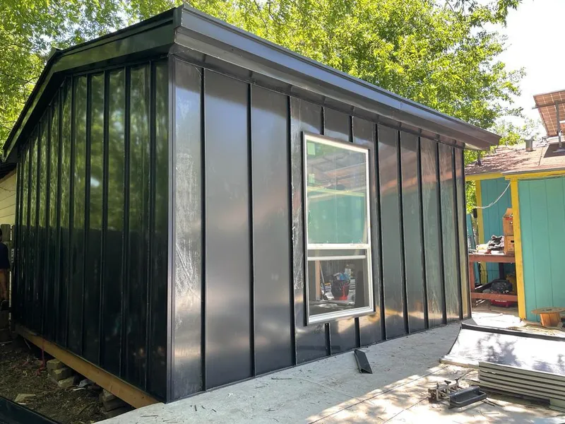 Black standing seam metal wall panels for Metal Roof Installation in Corning